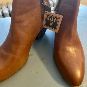 Frye boots never worn, I just tried them around the house.